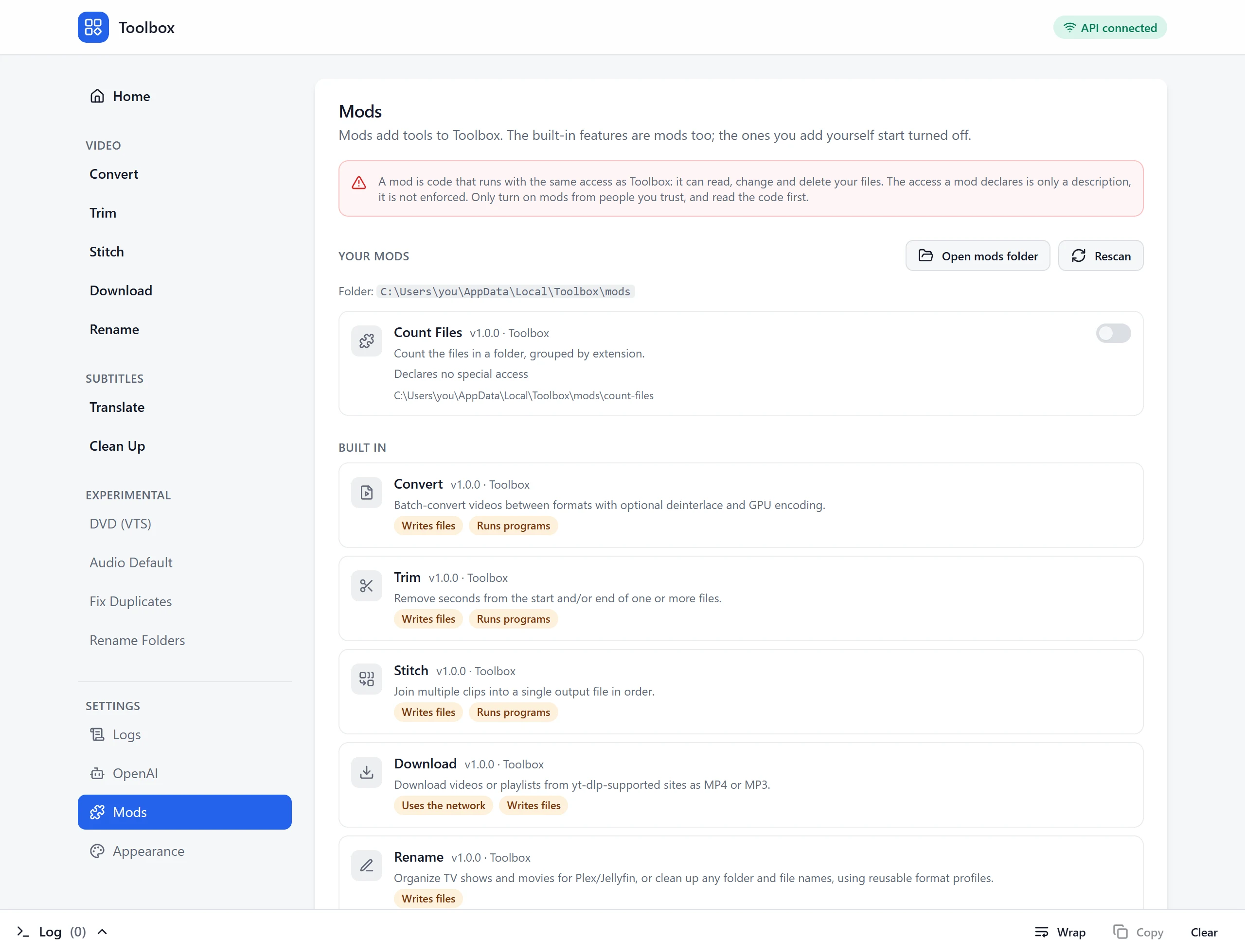The Mods page: your own mods with an on/off switch, and the built-in tools with a note on what each one does.